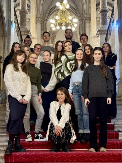 Students on a staircase for a group photo